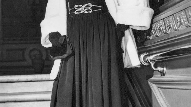Van Roth sstrachan black crepe dress & coat modelled by Ronnie Goodlet c1948